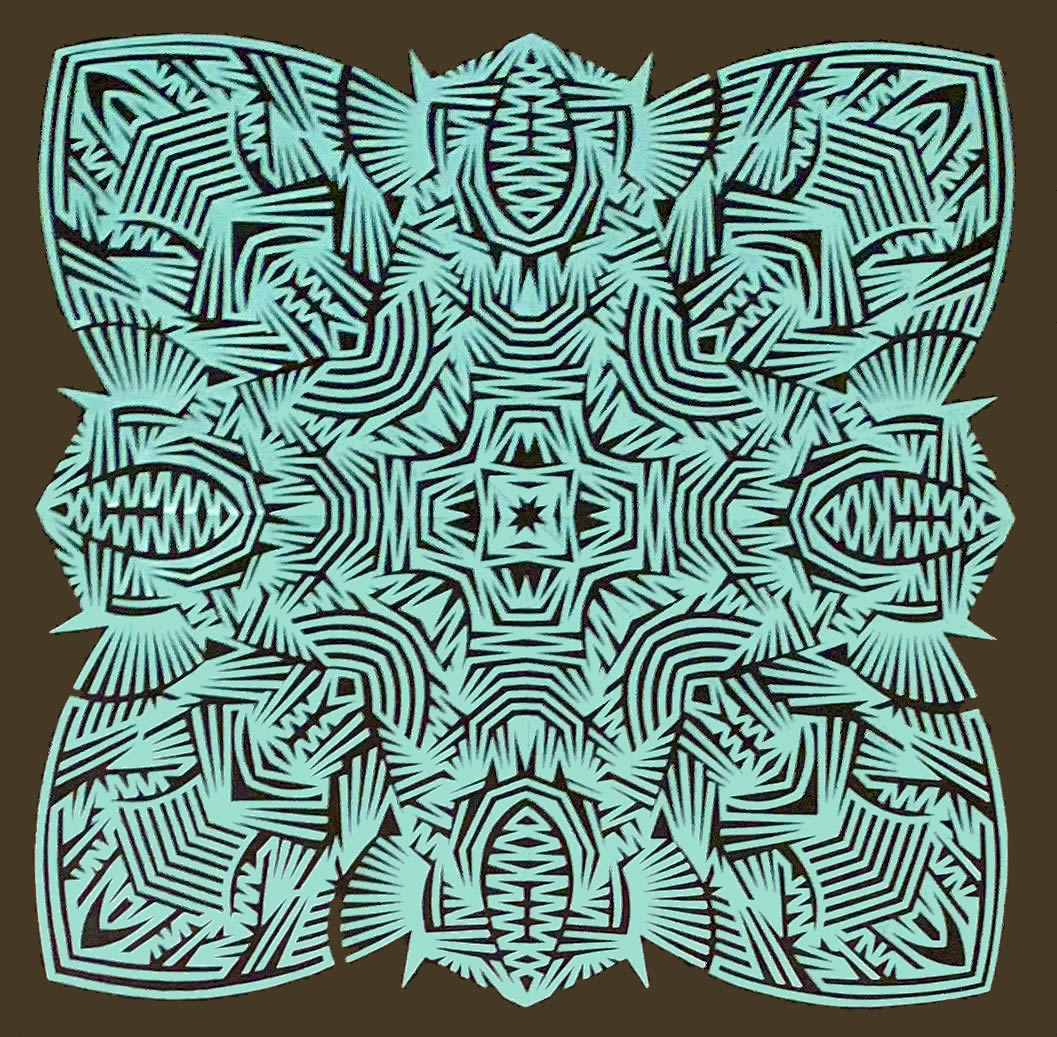 Teal paper-cut mandala artwork